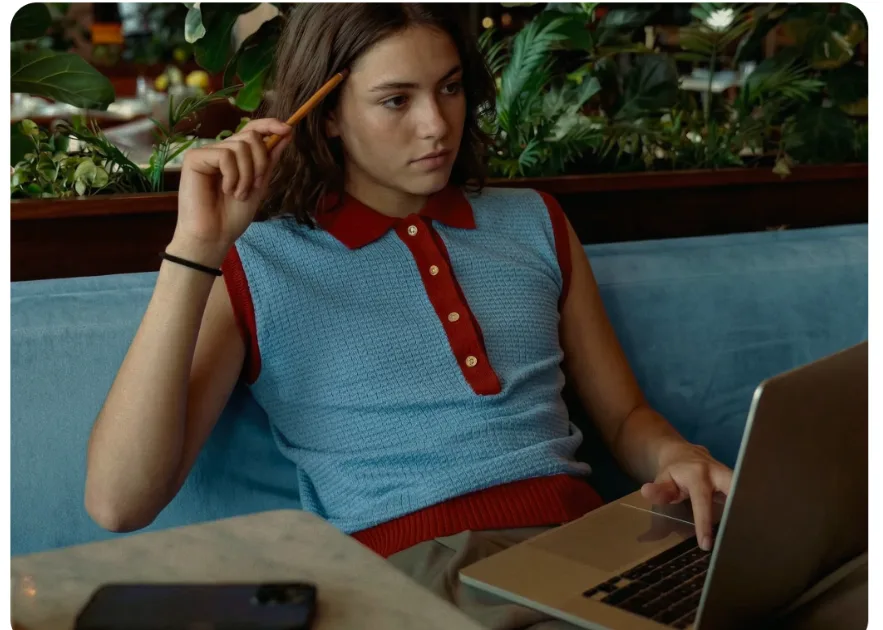 Marketer working at a laptop